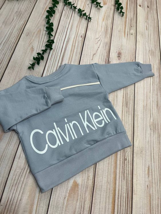 بلوز تک جیب پسرانه مدل Calvin مناسب سنین 1 تا 14 سال