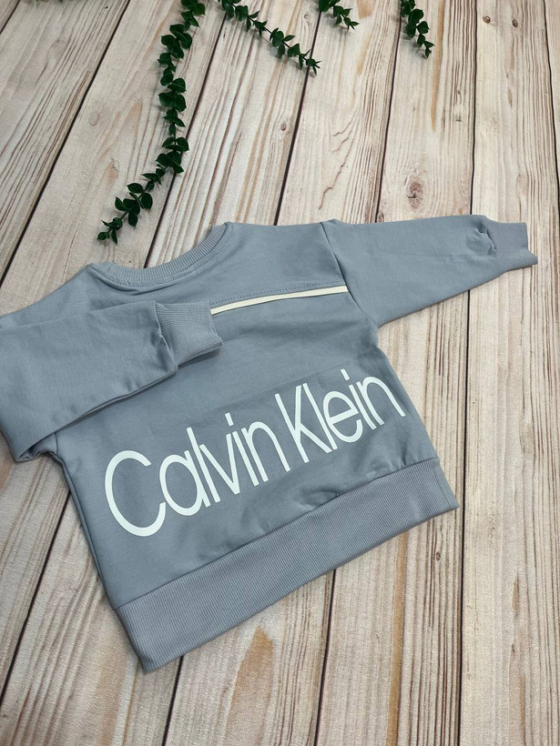 بلوز تک جیب پسرانه مدل Calvin مناسب سنین 1 تا 14 سال