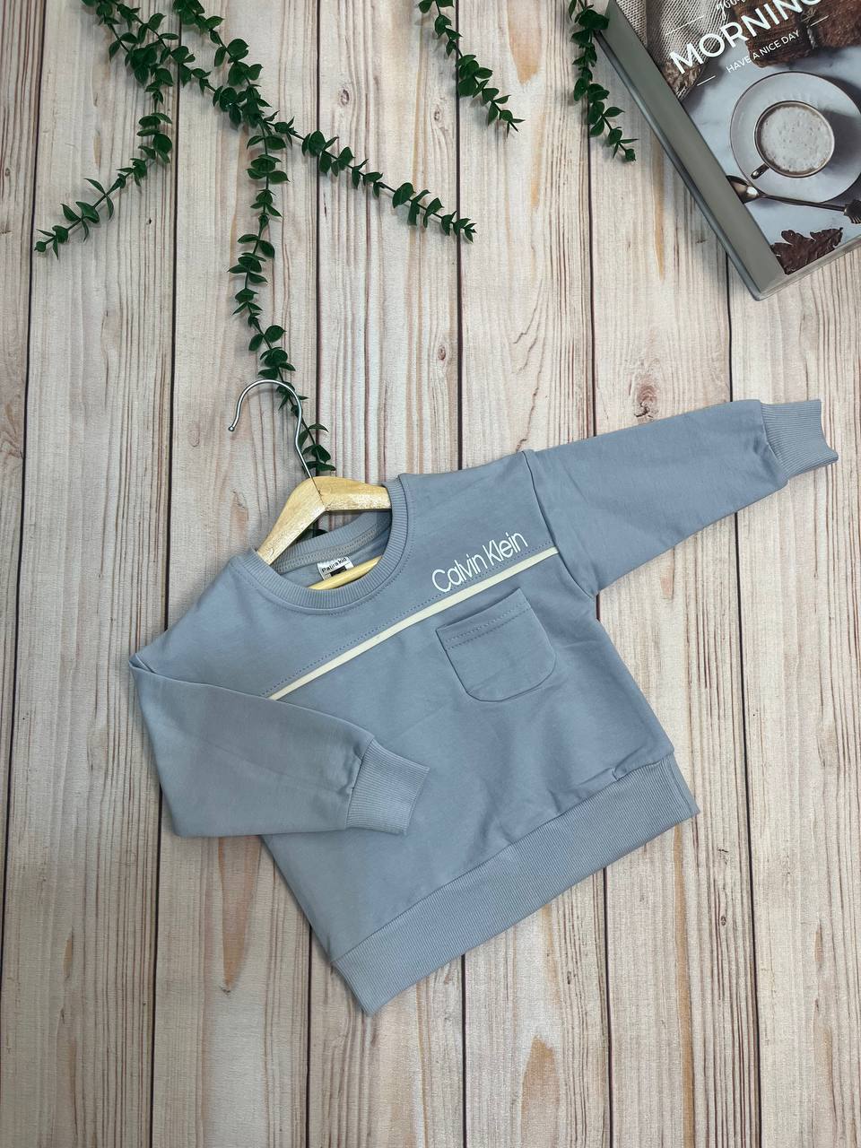 بلوز تک جیب پسرانه مدل Calvin مناسب سنین 1 تا 14 سال